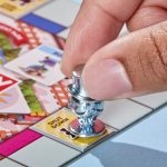 Monopoly GO! Board Game | Inspired by The Popular Mobile Board Game | Ages 8+ | 2-4 Players | 15 Mins. | Family Games | Travel Games for Kids and Adults (English & French) - Image 4